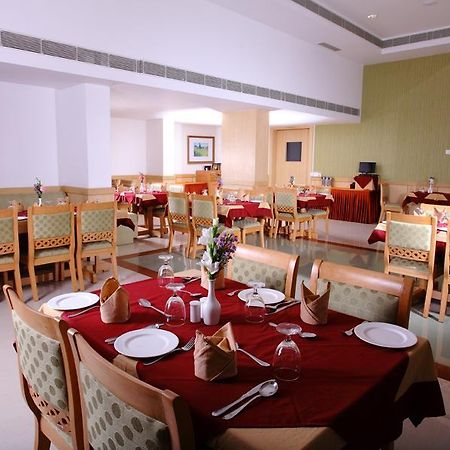 Pooram International Hotel Thrissur Exterior foto