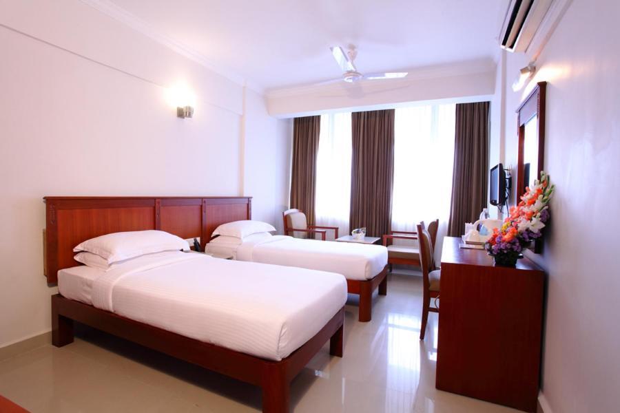 Pooram International Hotel Thrissur Quarto foto